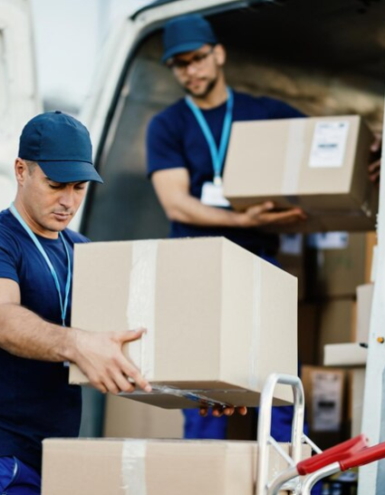 A person working with boxes and moving.